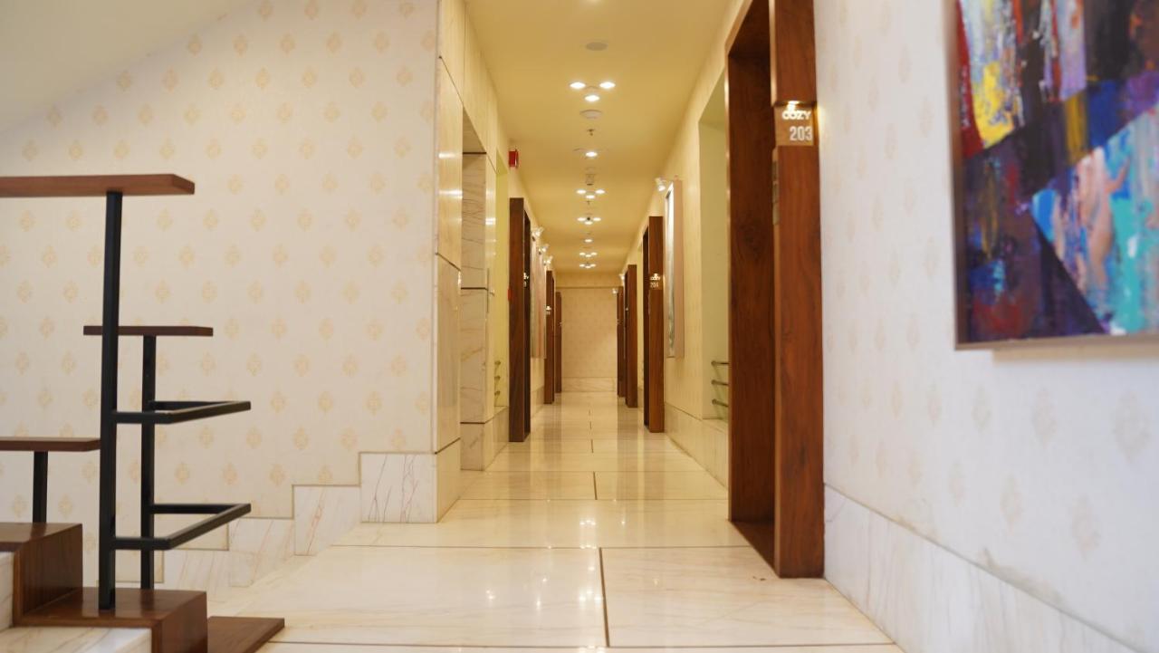 De Glance Hotel سورات المظهر الخارجي الصورة